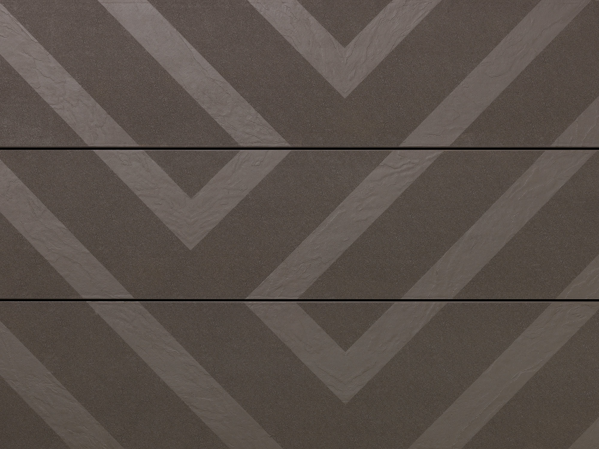 Millboard Modello Linear in Ebony Grey: detail van het geometrische patroon over drie plankdelen