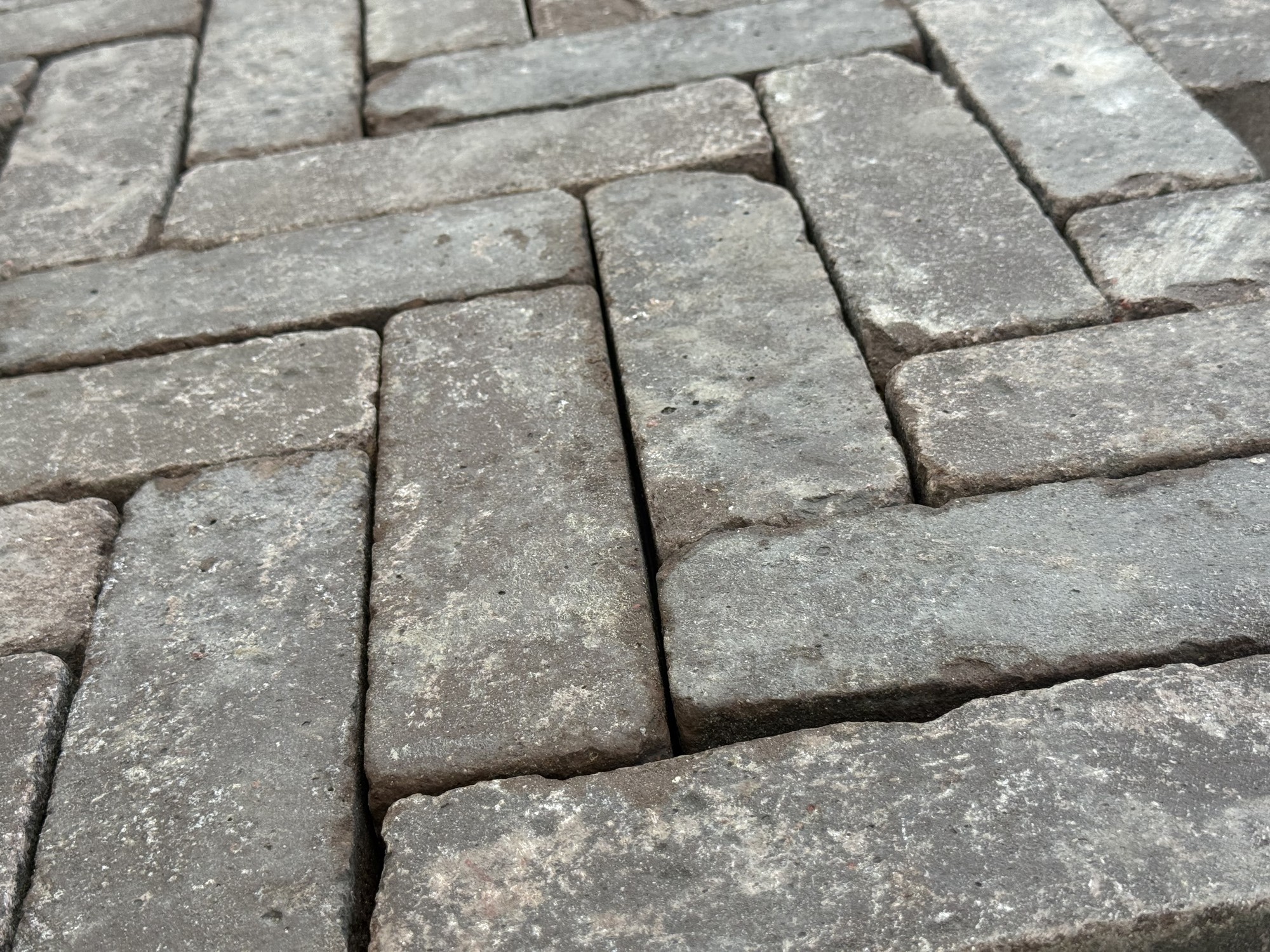 Oud gebakken Lingeformaat mangaan — detail van kleur en structuur